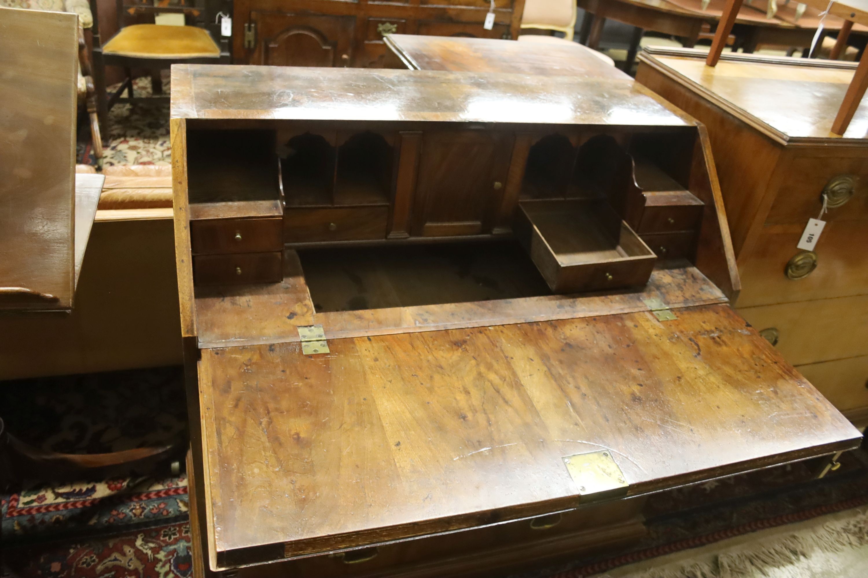 A George II figured walnut bureau, width 99cm, depth 53cm, height 98cm